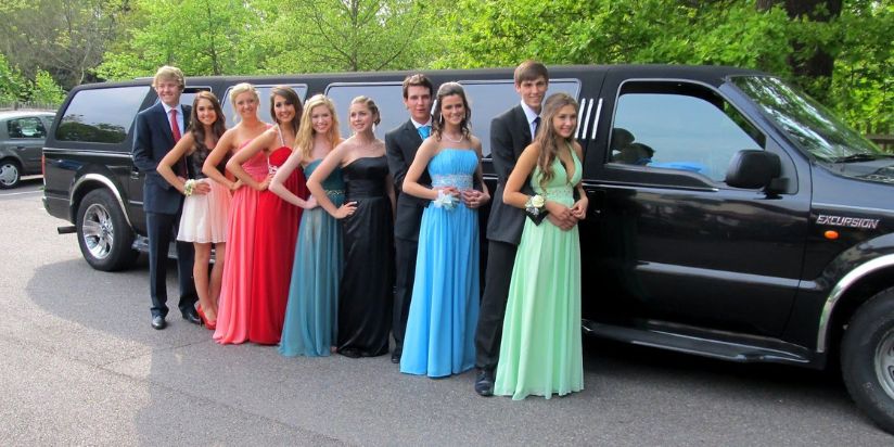 young girls and boys are standing outside a limousine ready to go to their prom
