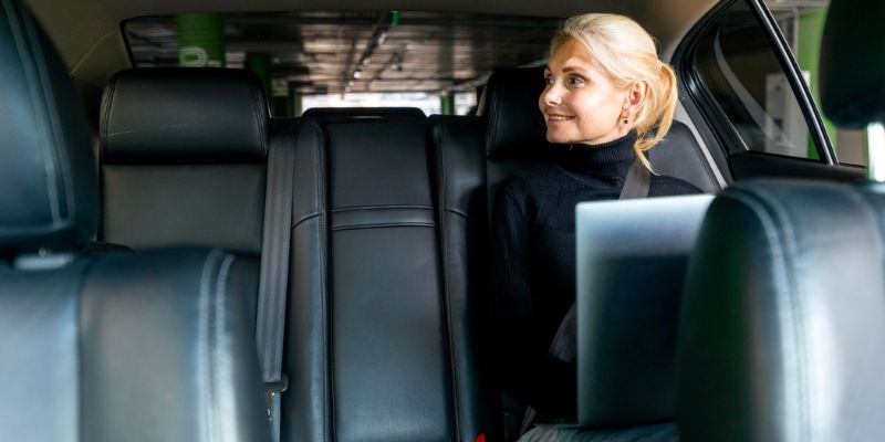 Women sitting in limo car